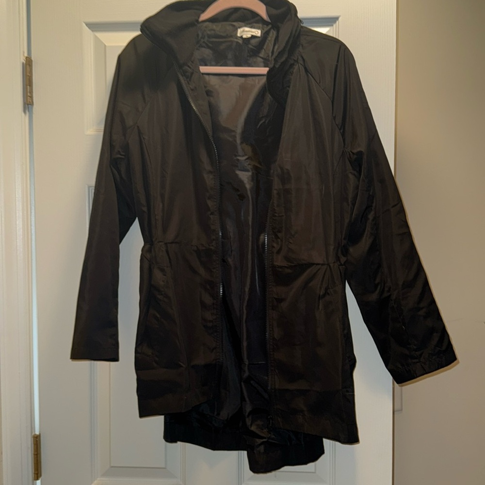 Black rain coat with hood. Used.